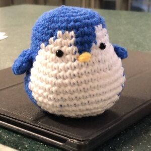 Hello, This is crocheted Penguin of palm size. Perfect for gifts.